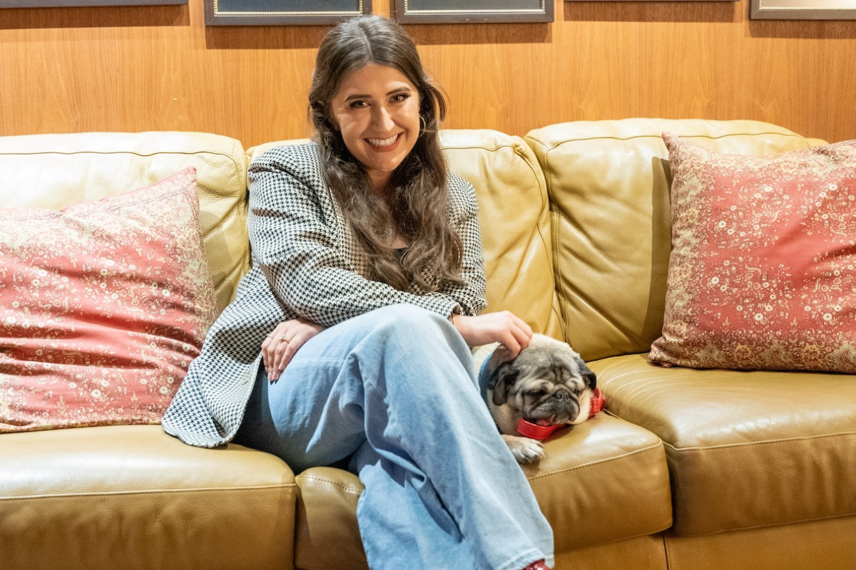 Music Business alumna Leslie Mosier and her dog, Doug the Pug