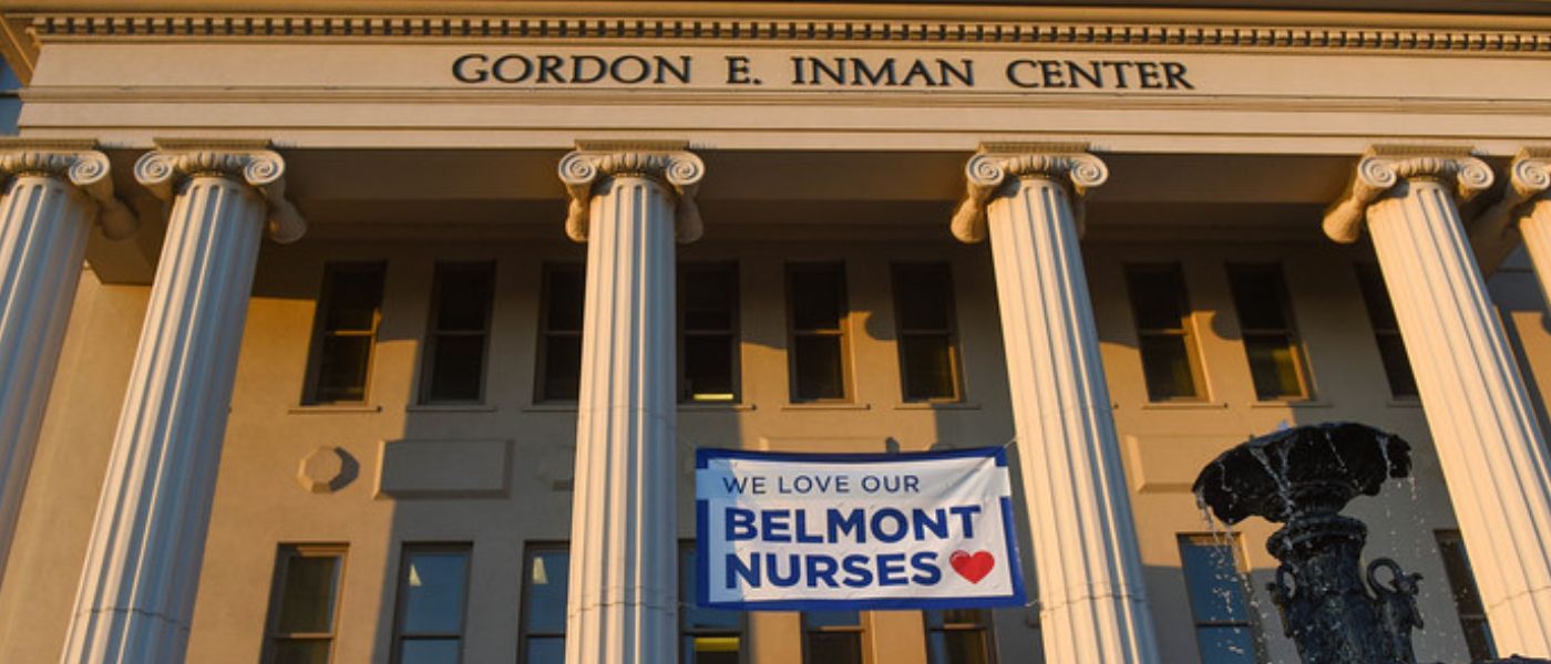 A banner that reads "We love our Belmont nurses" hanging from The Inman College of Nursing