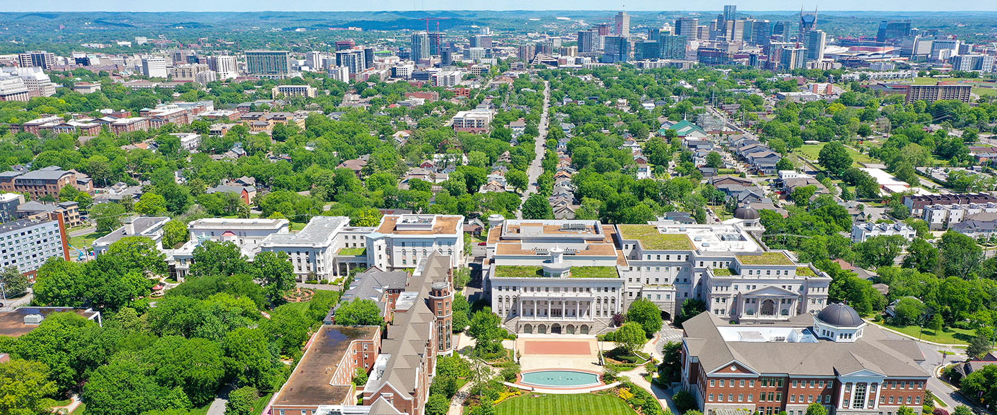 an aerial view of Belmont with Nashville in the background