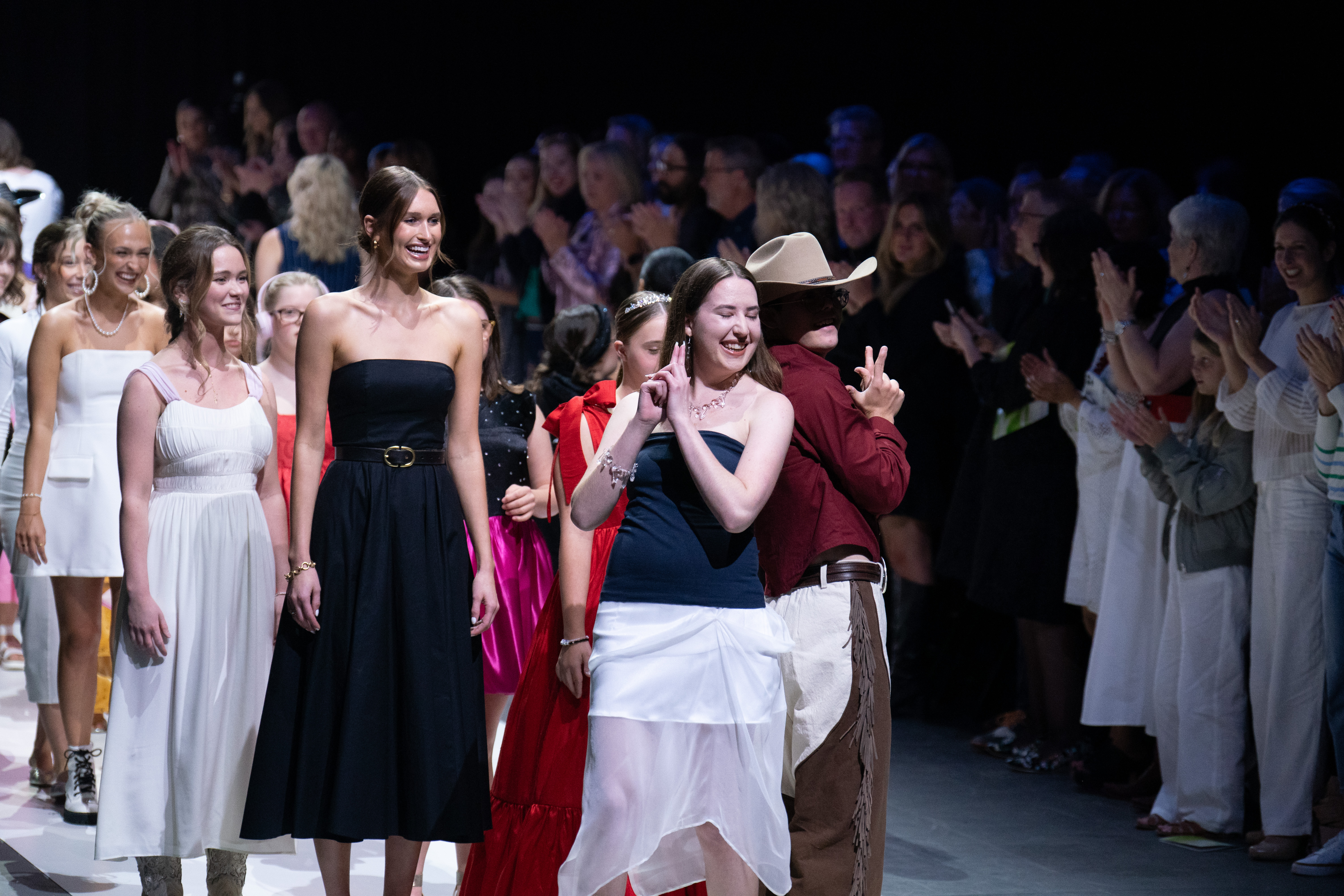 GiGi's participants and designers on the runway