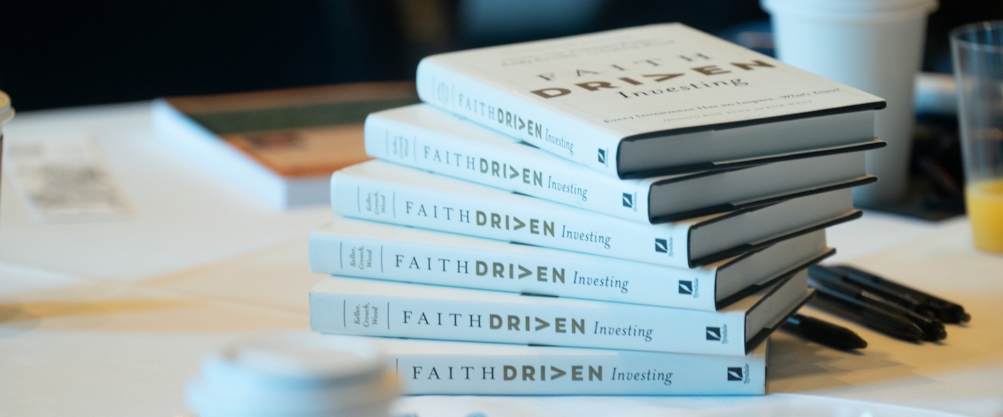 a stack of faith driven investing books