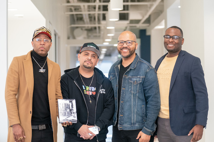 Drumma Boy in group photo with three other people