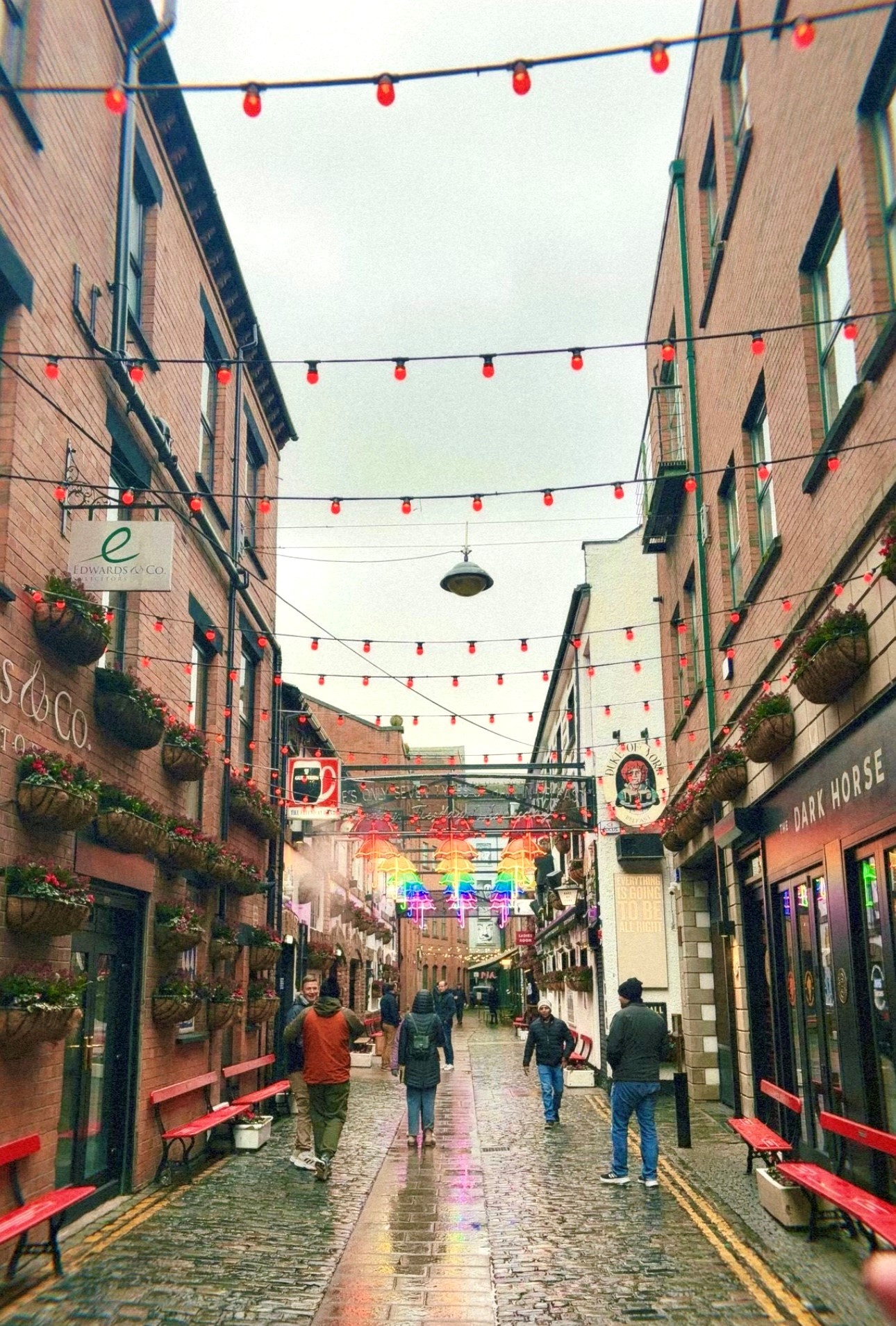 Makenna Kunz captures the essence of Belfast's historic charm in Duke of York Alleyway, blending past and present in a single frame
