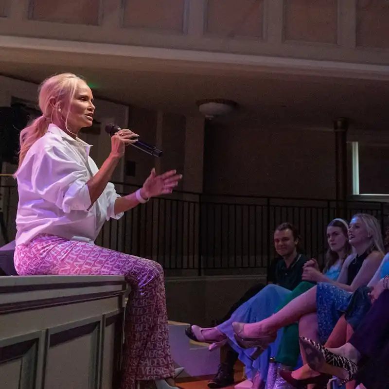 Belmont basketball player dribbles past an MTSU player