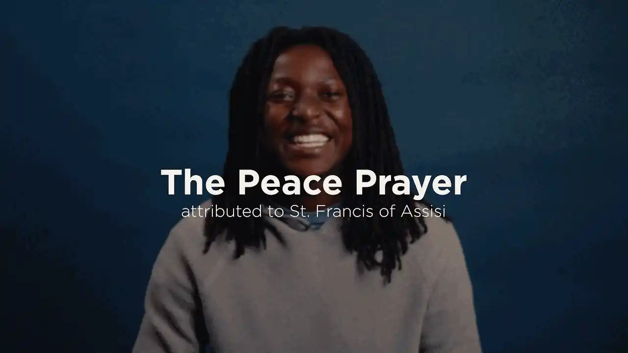 Person with hands clasped in prayer or meditation with "The Peace Prayer" text overlay on a blue background