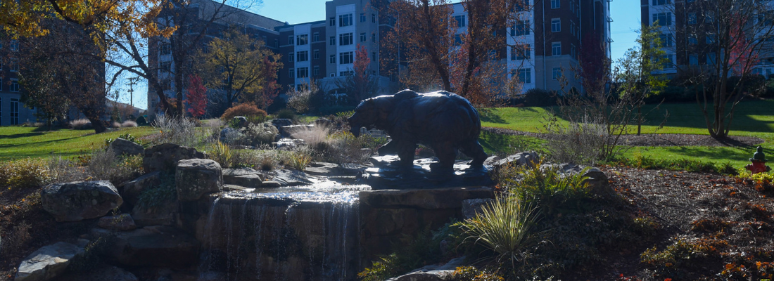 Belmont's Bear Statue at the Bear Creek waterfall