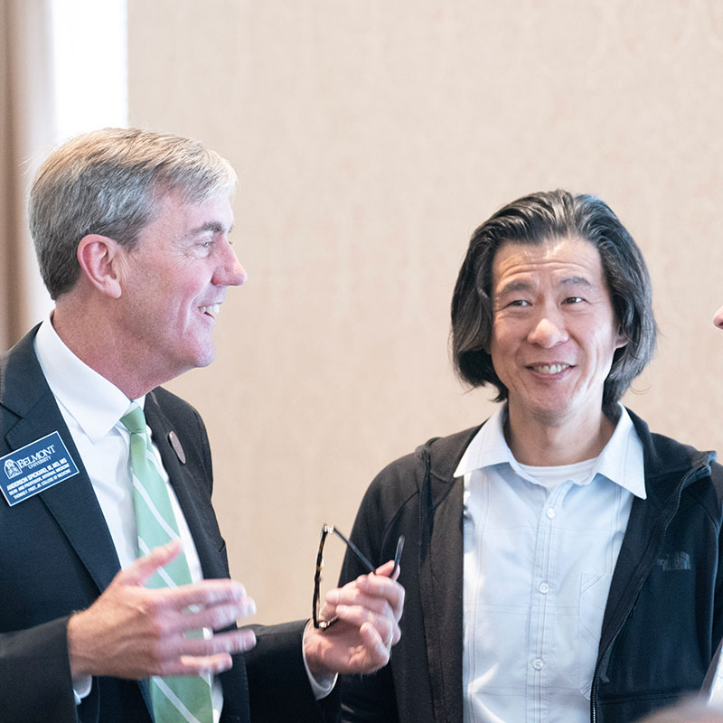 Two faculty members from the College of Medicine having a discussion