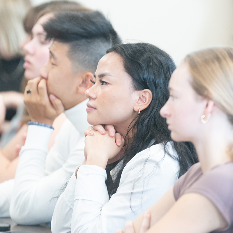 Students in class listening to lecture