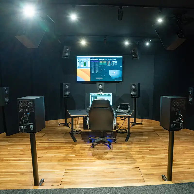 Dolby Atmos mixing studio featuring immersive audio monitoring, professional production software and industry-standard equipment used for hands-on audio engineering and post-production training.