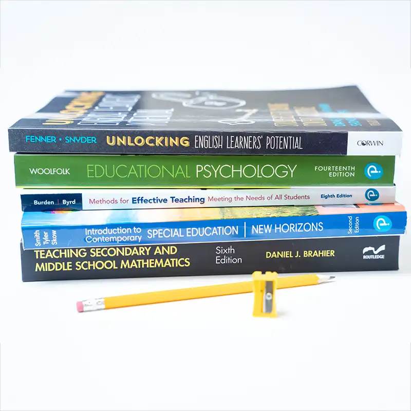 A collection of education textbooks highlights coursework in teaching methods, educational psychology, special education and English learner instruction, reflecting preparation for today's classrooms.