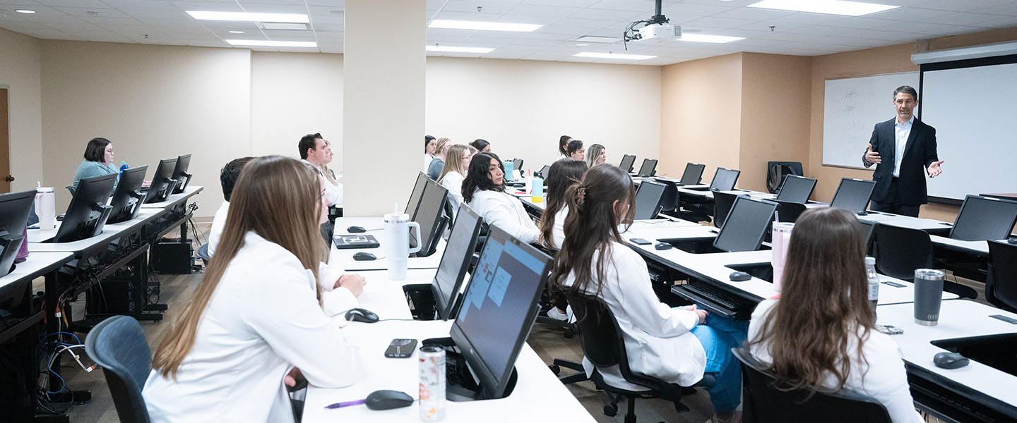 A class of pharmacy students listening to a Data Science lecture