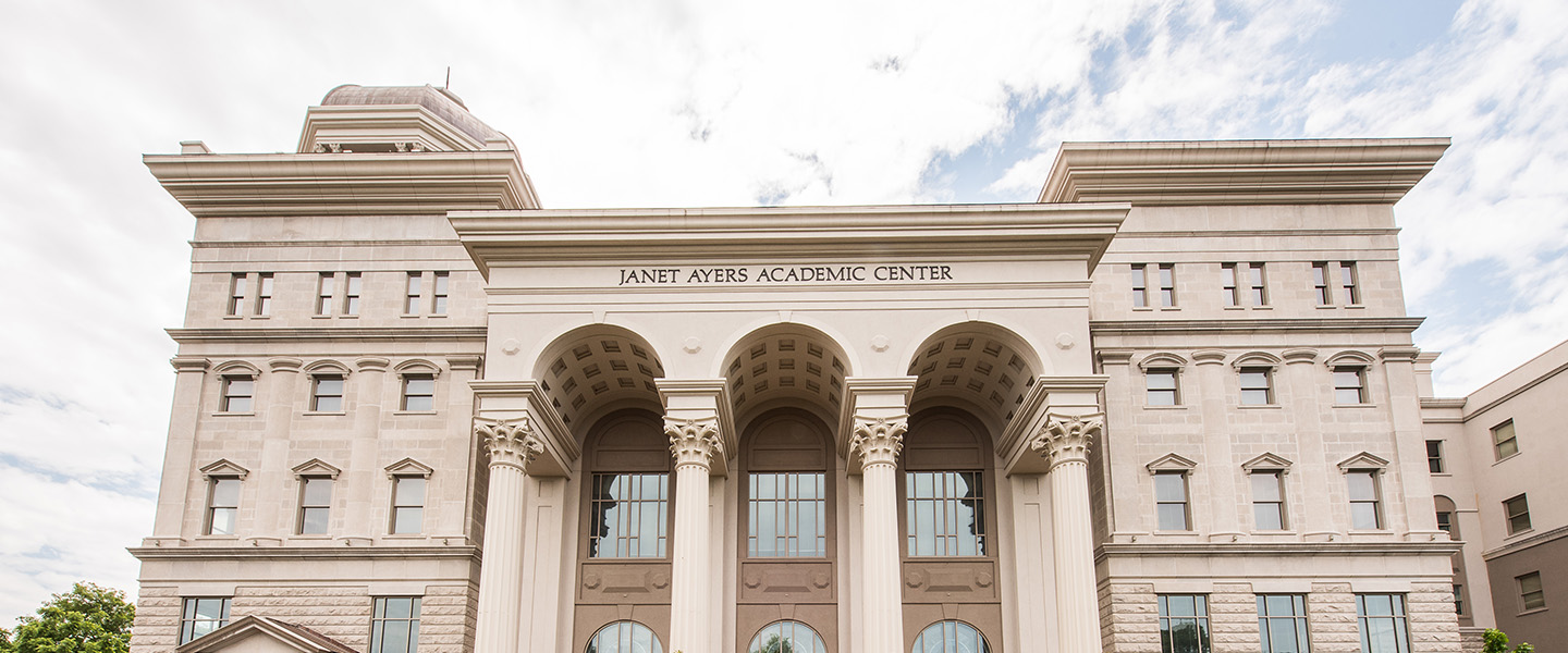 A picture of the front of the Janet Ayers Academic Center.