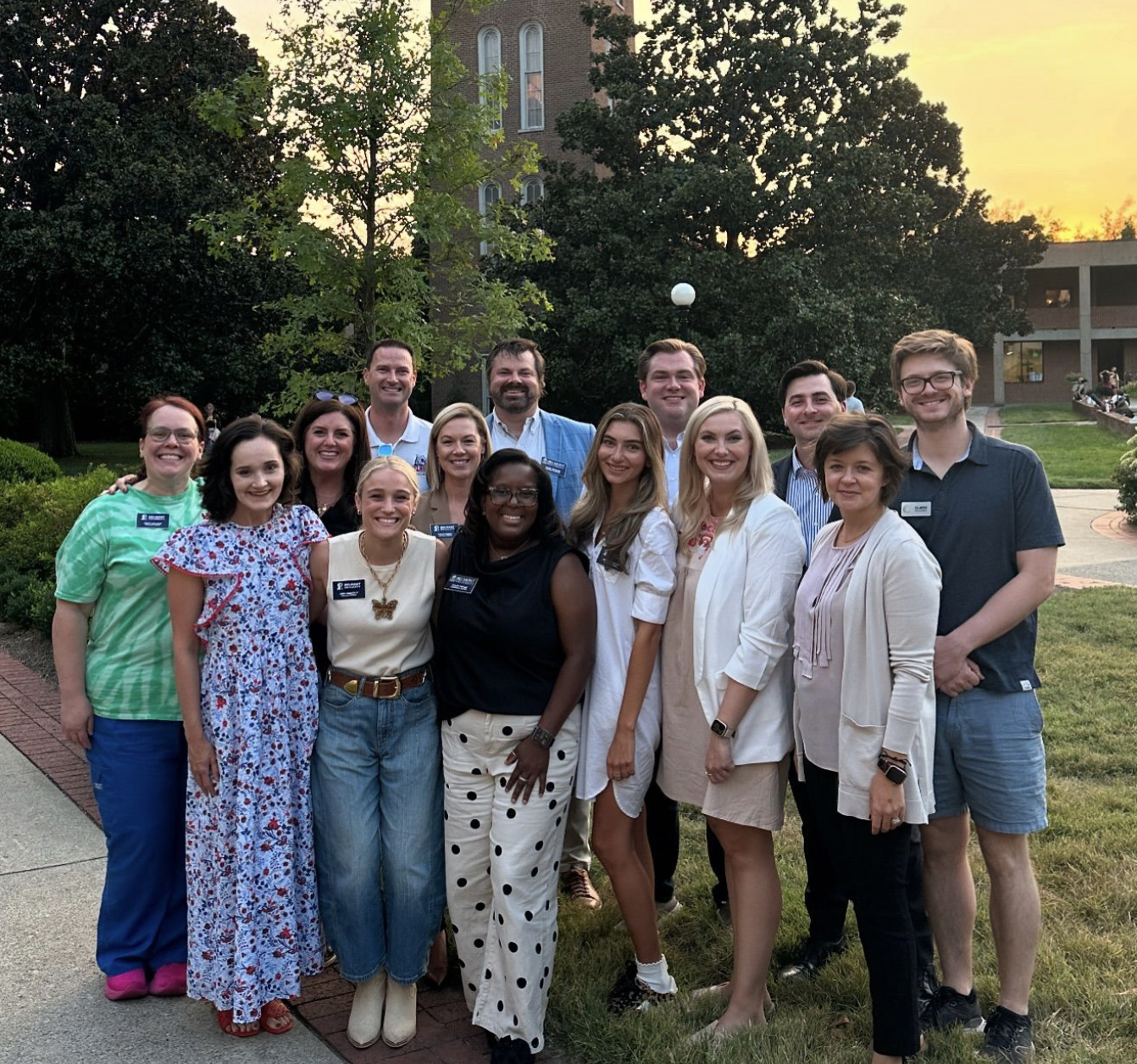 The Alumni Board poses in front of the Bell Tower