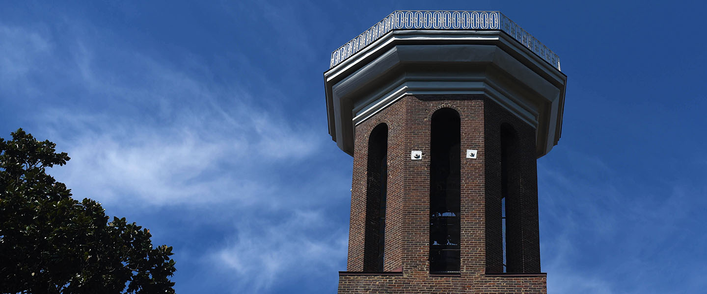 A photo of the Bell Tower against a blue sky.