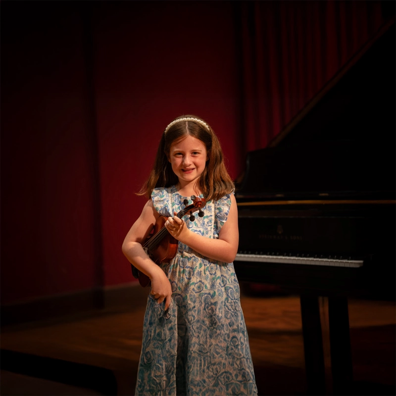A young girl with a violin