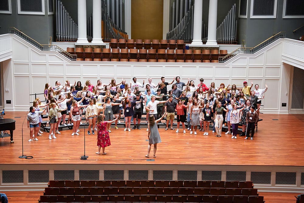 Summer camp students participate choir rehearsal