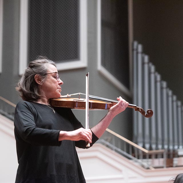 Music faculty member plays violin