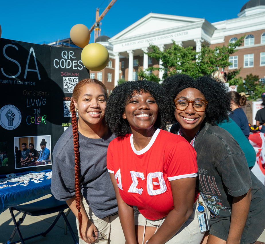 Three students from the Black Student Association at BruinLink Fair