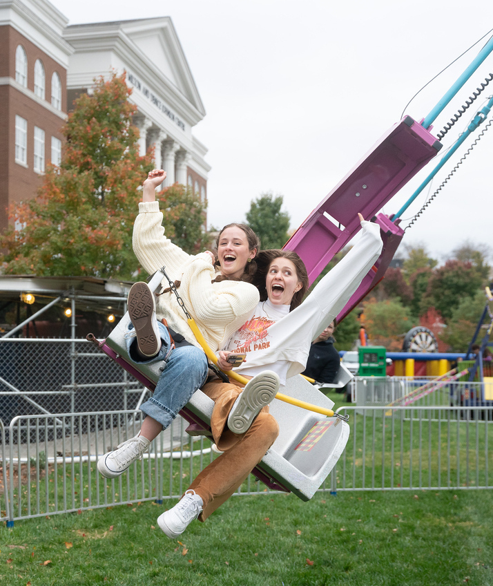 Students on a carnival ride during Fall Fest
