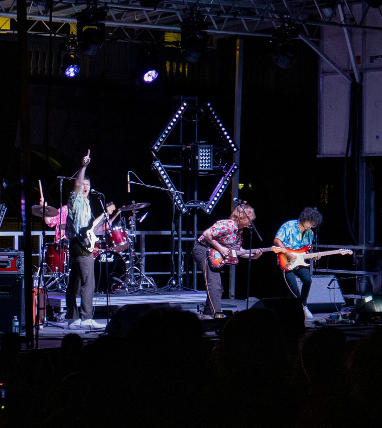 A student rock band performing on stage