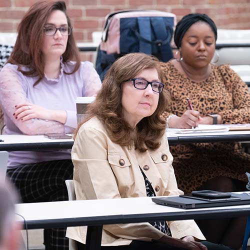 Students listen to class lecture