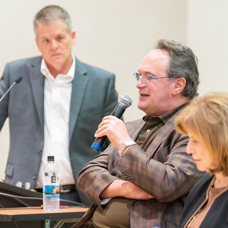 A speaker talking during a Charlie Curb Center event