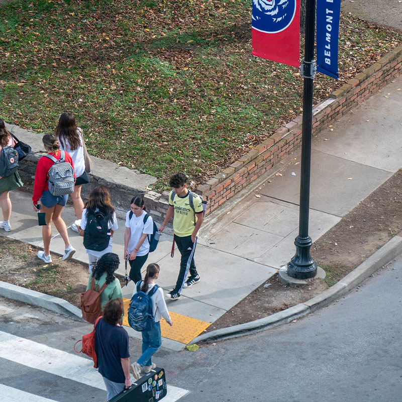 Students at a cross walk during a class change