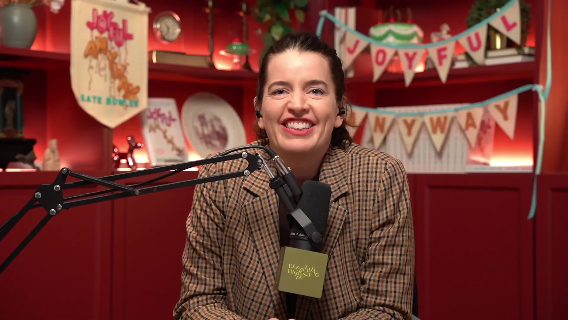 Kate Bowler recording the episode