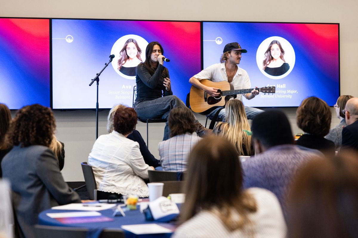 Belmont student singing on stage