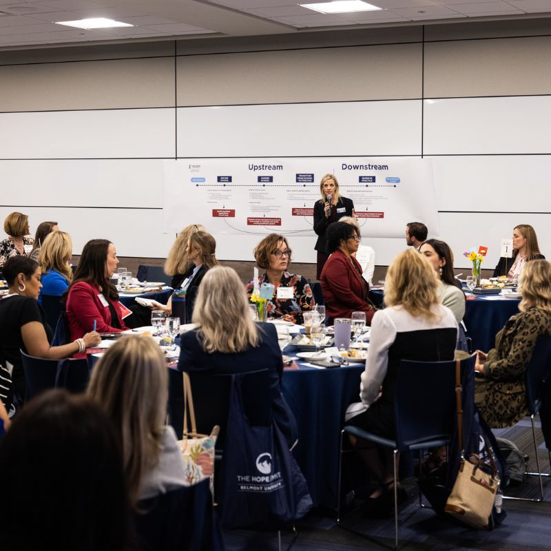 Woman presenting in a room