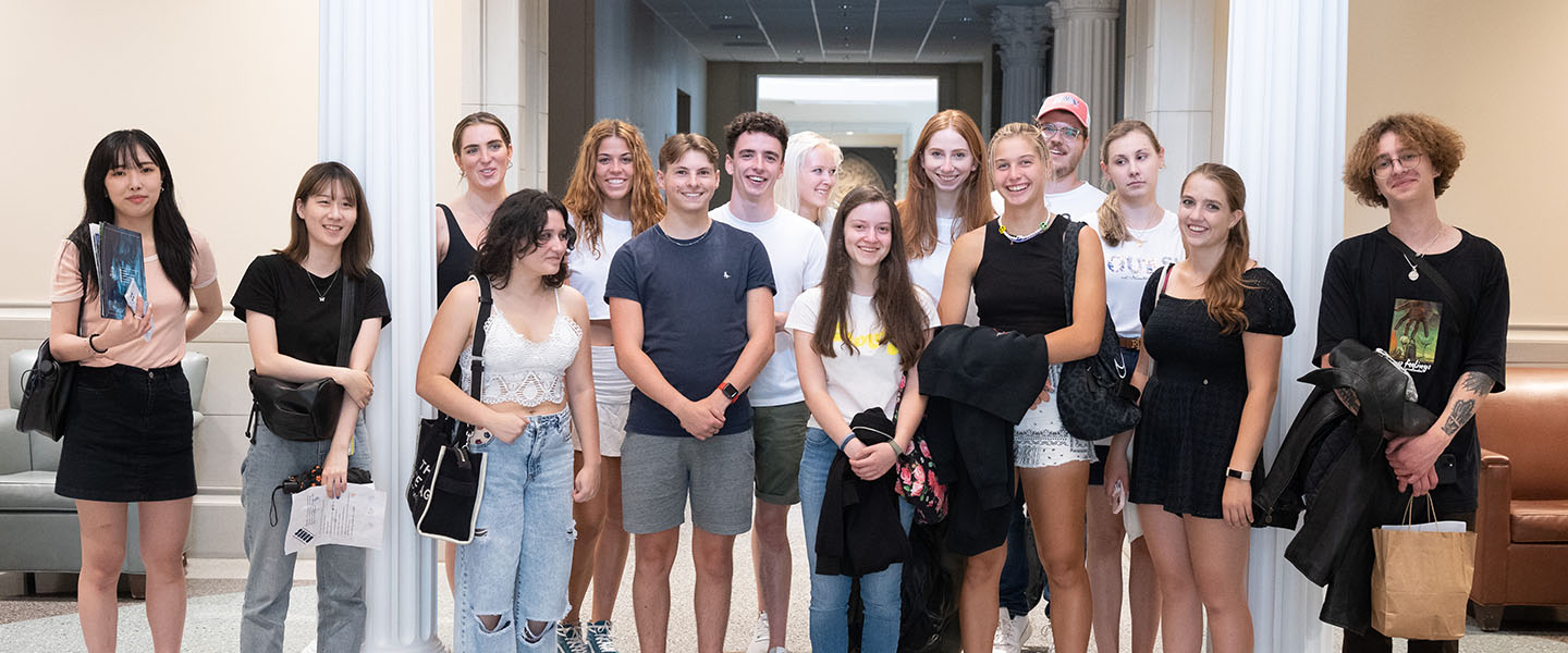 A group of international students smiling