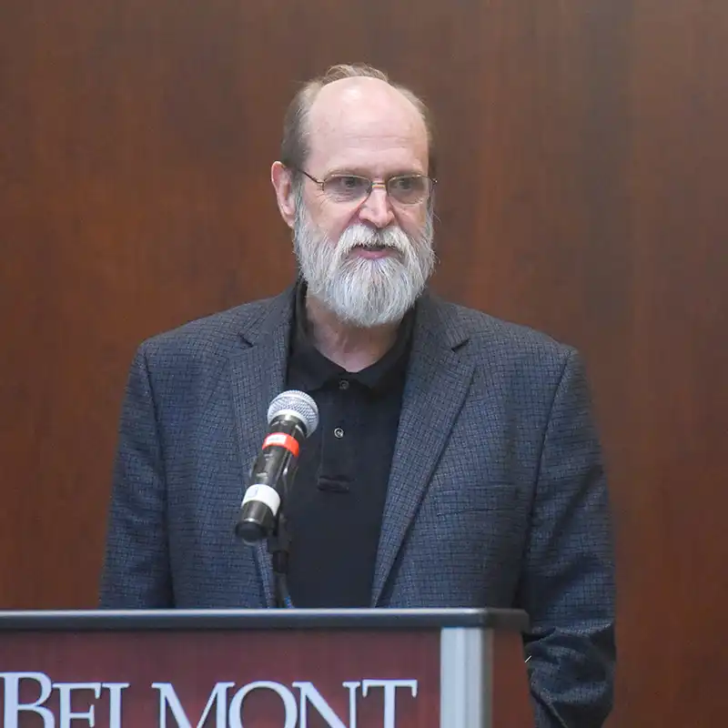 Jeff Cornwall speaking at a podium