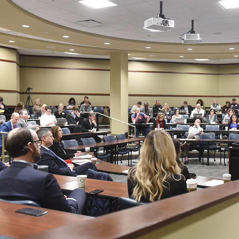 Students listening during a symposium