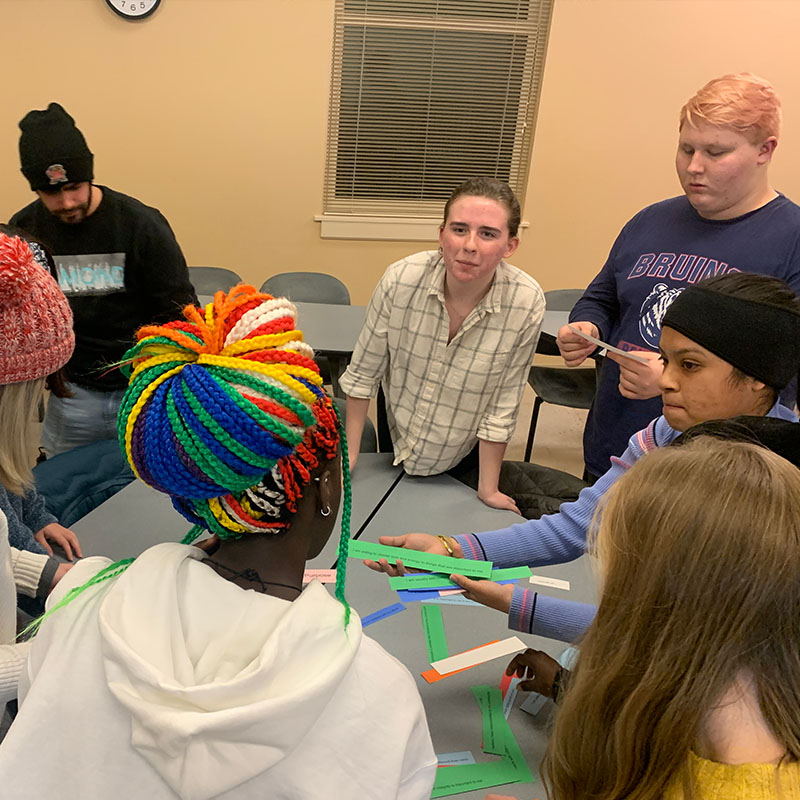 Students working together in a group during a leadership development event