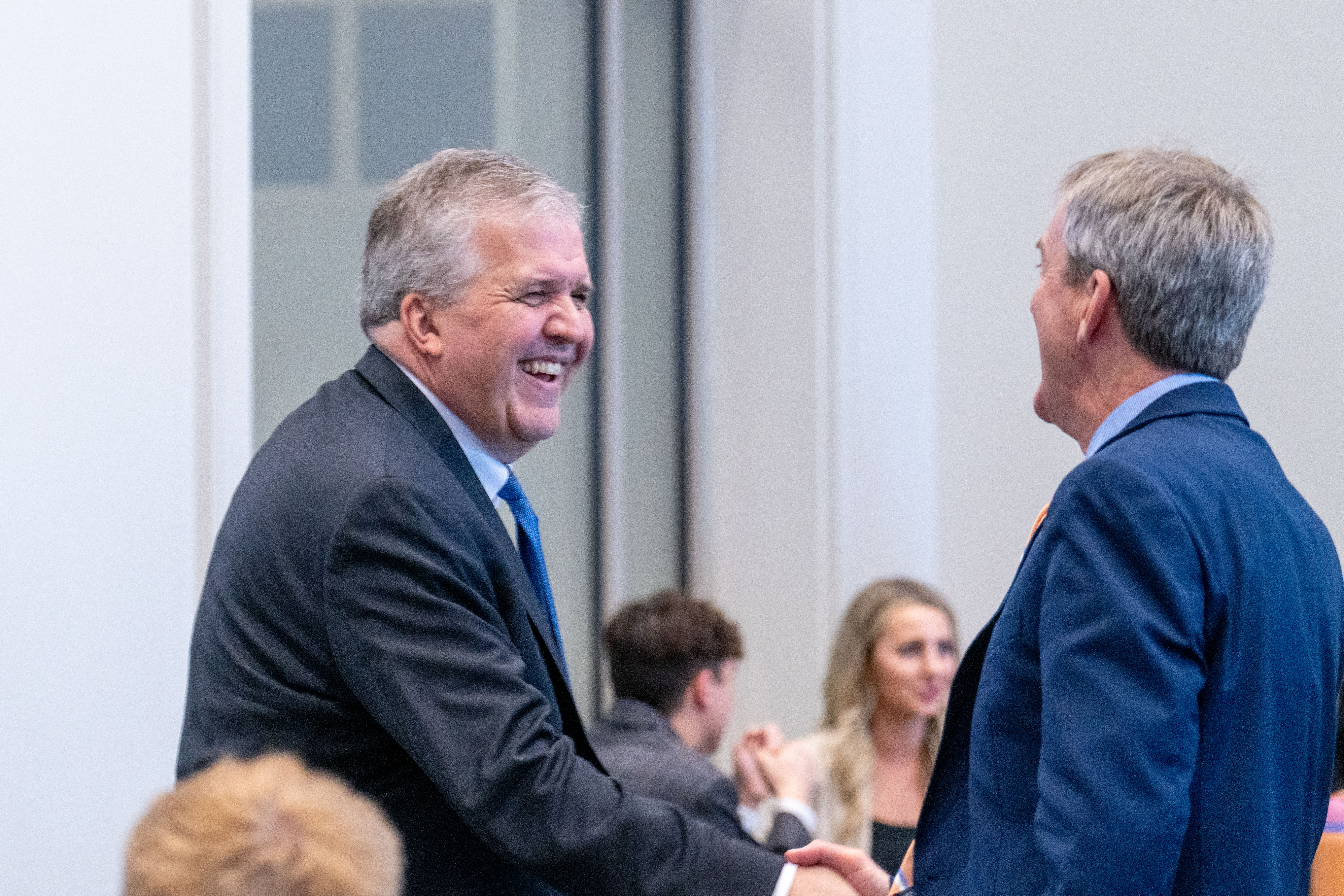 Belmont President and Dean of the medical school shake hands.