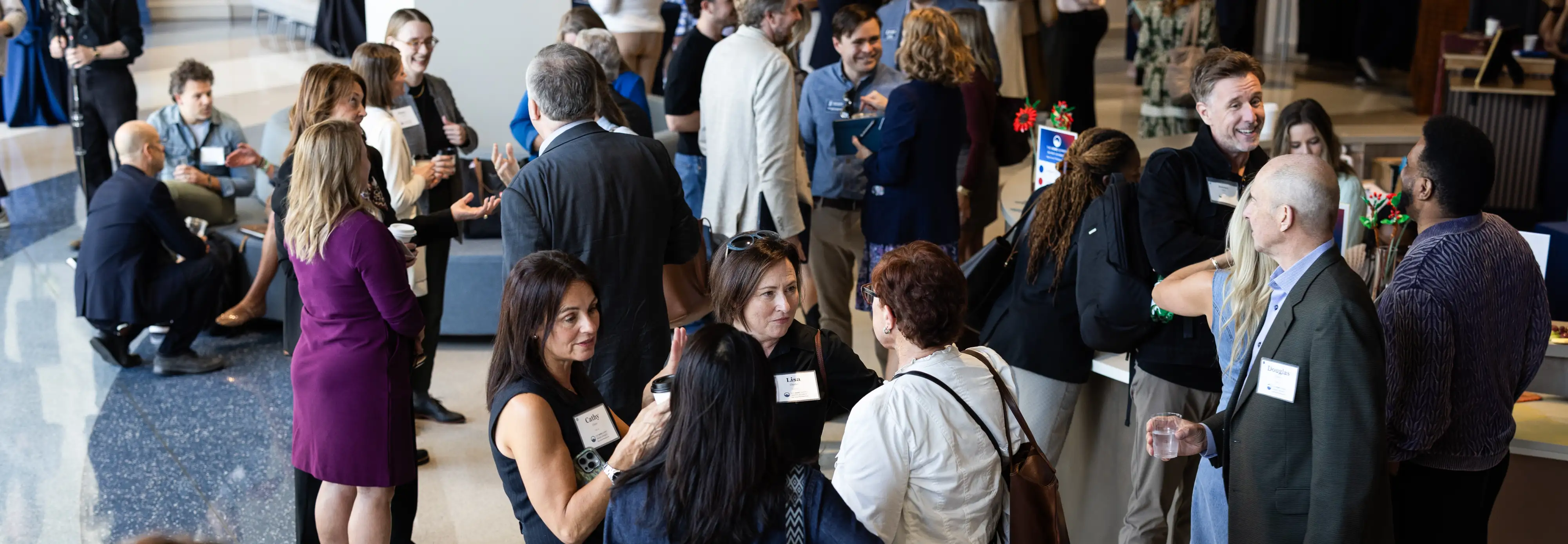 Attendees gather and network during a Belmont University Hope Summit event.