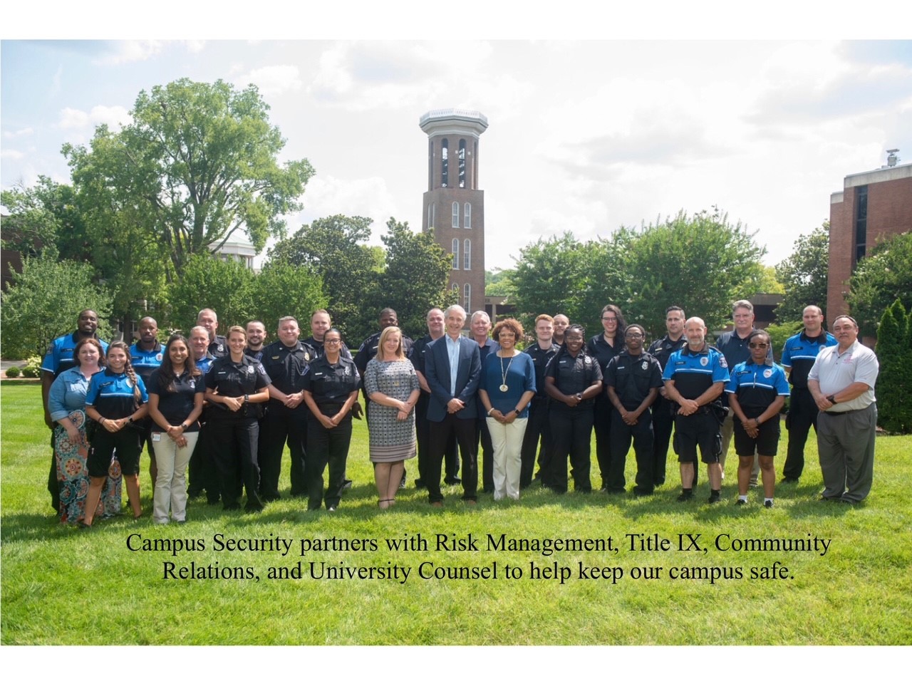 Members of the Office of Campus Security with Bruiser