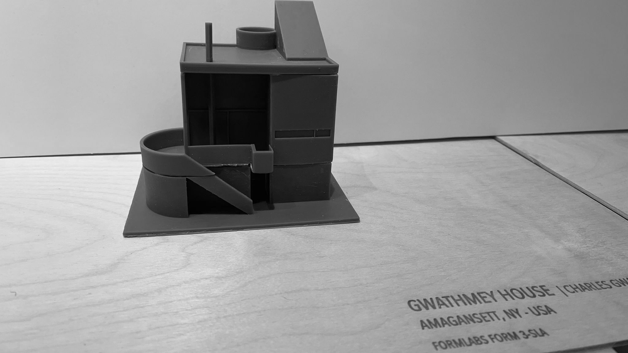 A picture of a two-story modern house model