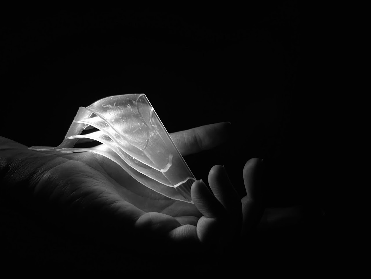 translucent 3d printed 4 layer object lit in a hand