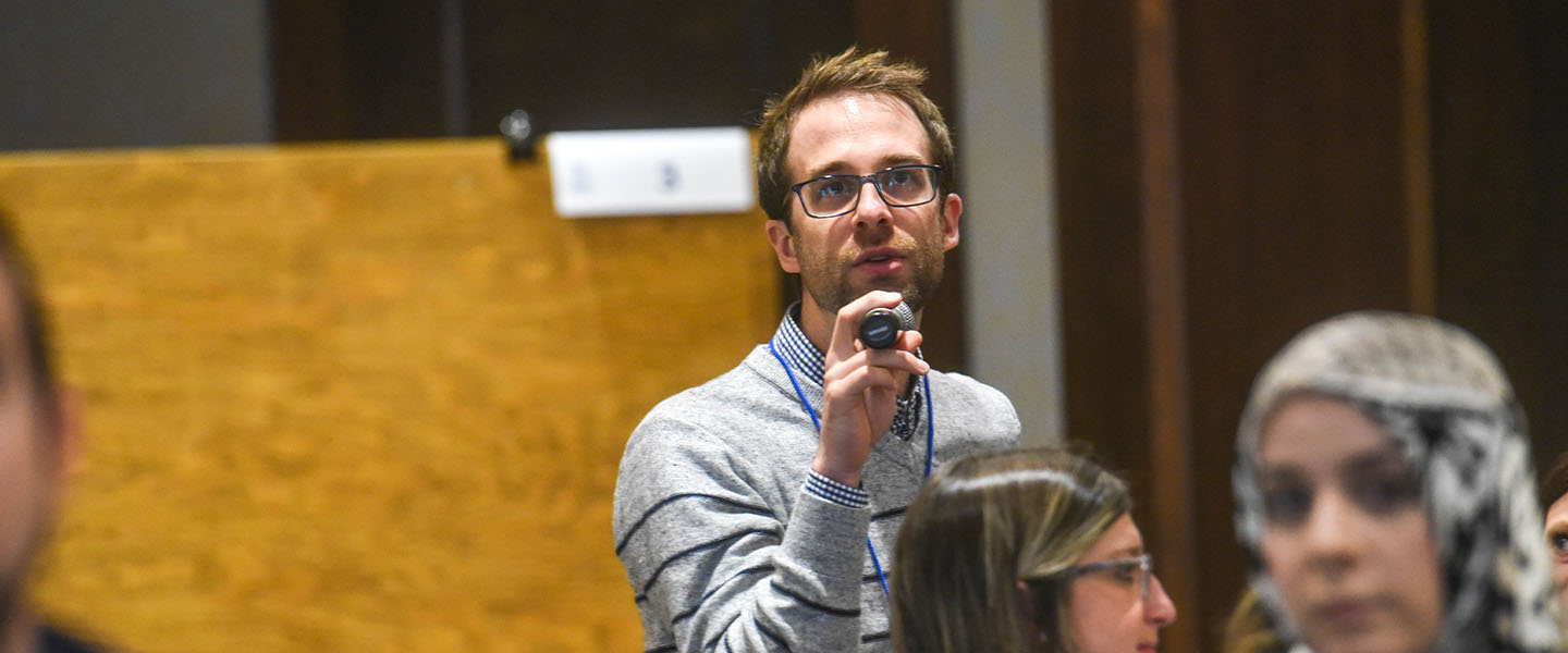 A Pharmacy alumni speaking during a continuing education event