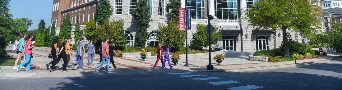 A photo of a group of Belmont students walking toward the Johnson Center.