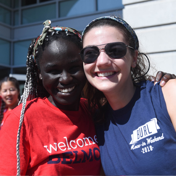 Two female Belmont students posing together for a photo on move-in day.