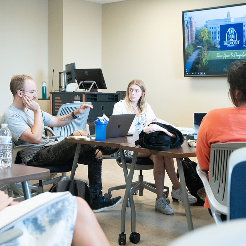 Student having a discussion in a business class