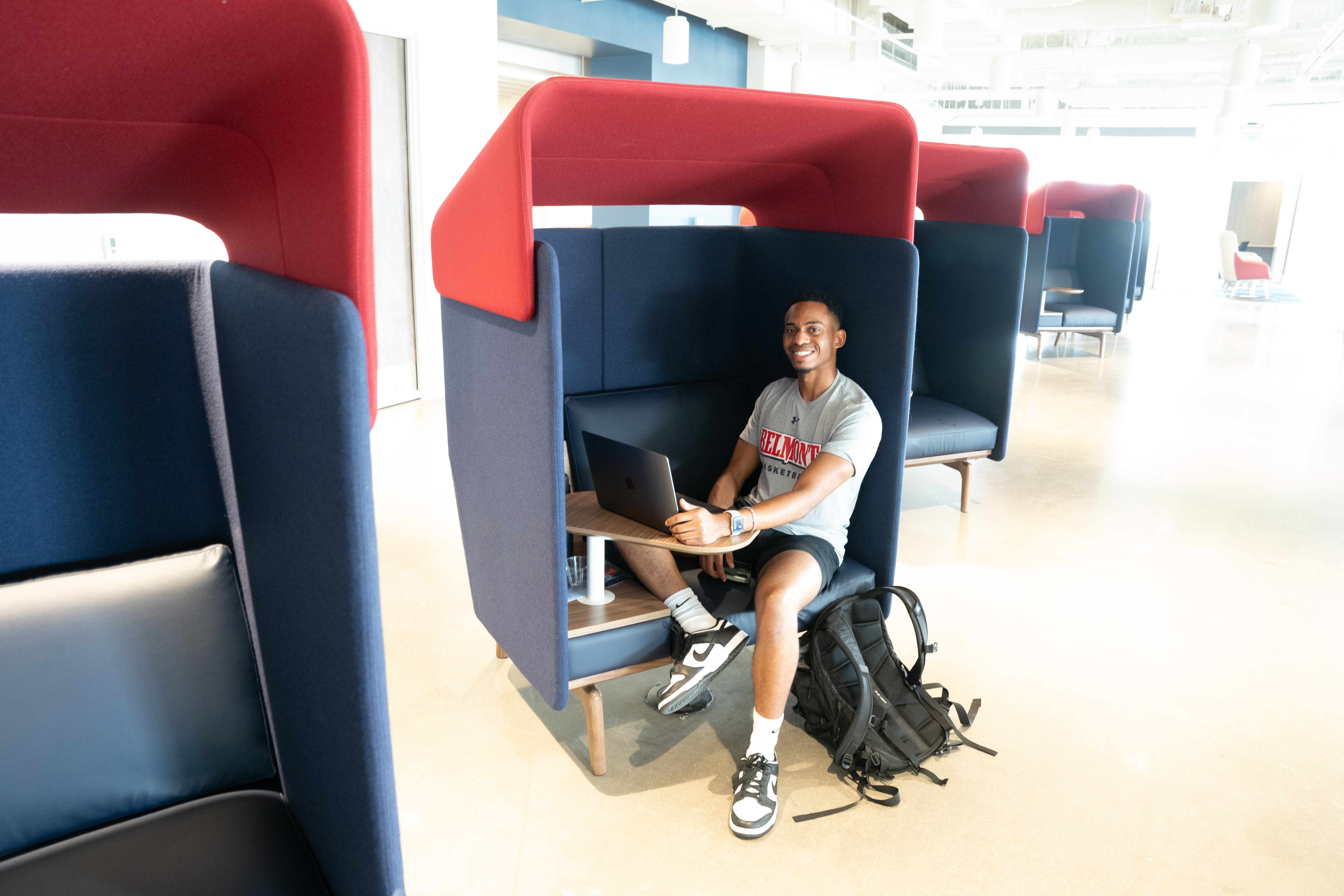Student in study cubical in Massey Center