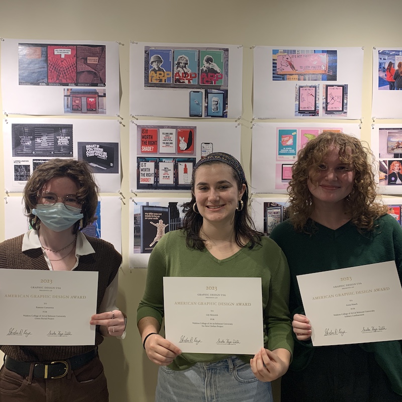 Students Ramzee Camarena, Lilli Heinrich and Anna Maack stand side by side with their GDUSA awards