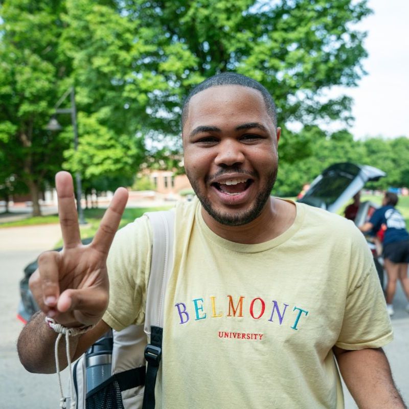 Student doing a peace sign