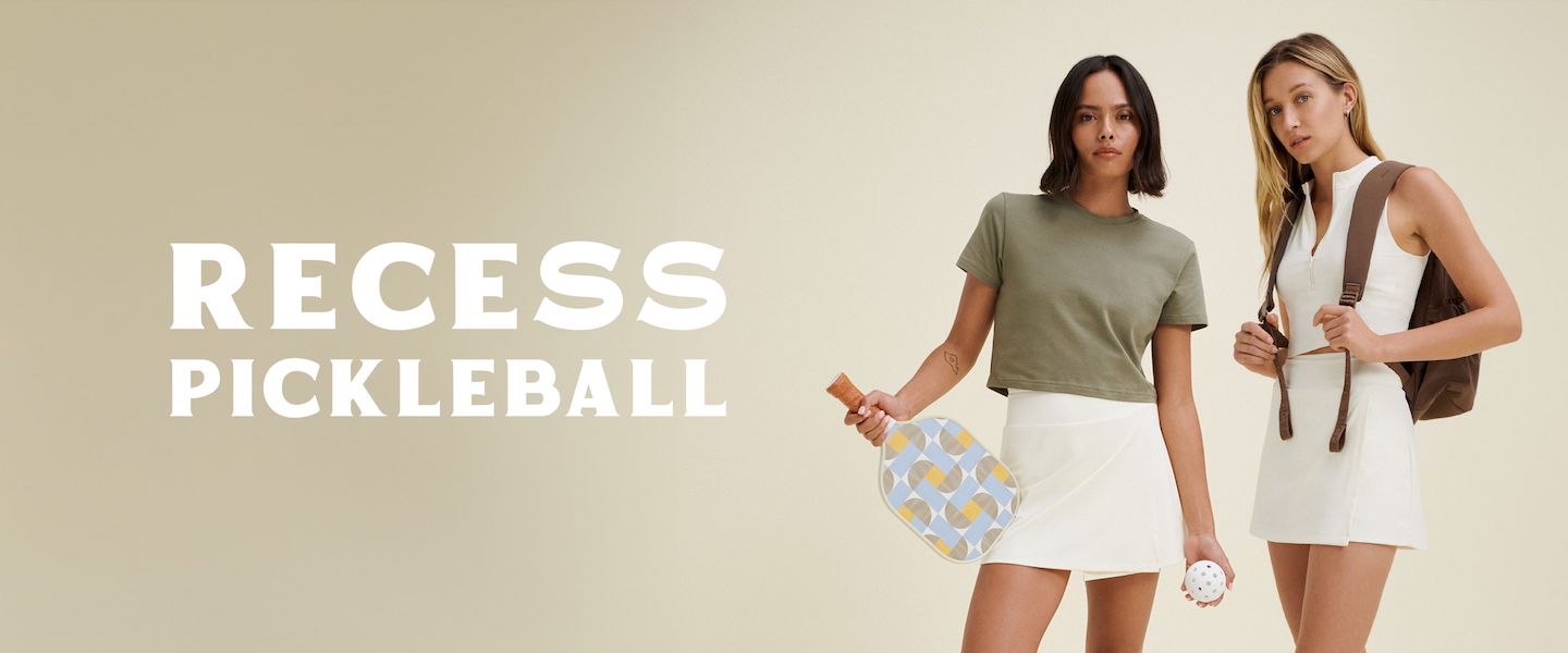 Two women modeling Recess Pickleball gear