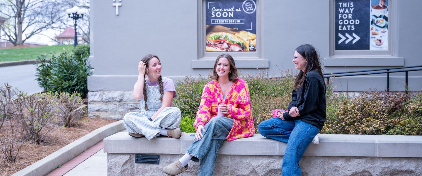 Students relax outside