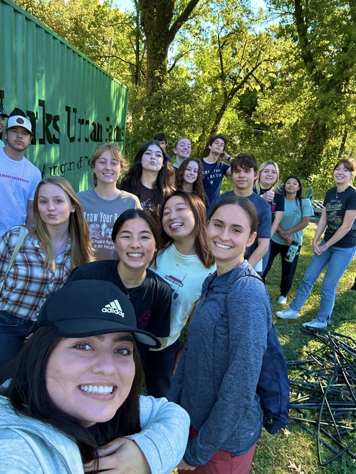 Students take selfie outside at The Works Urban Farm