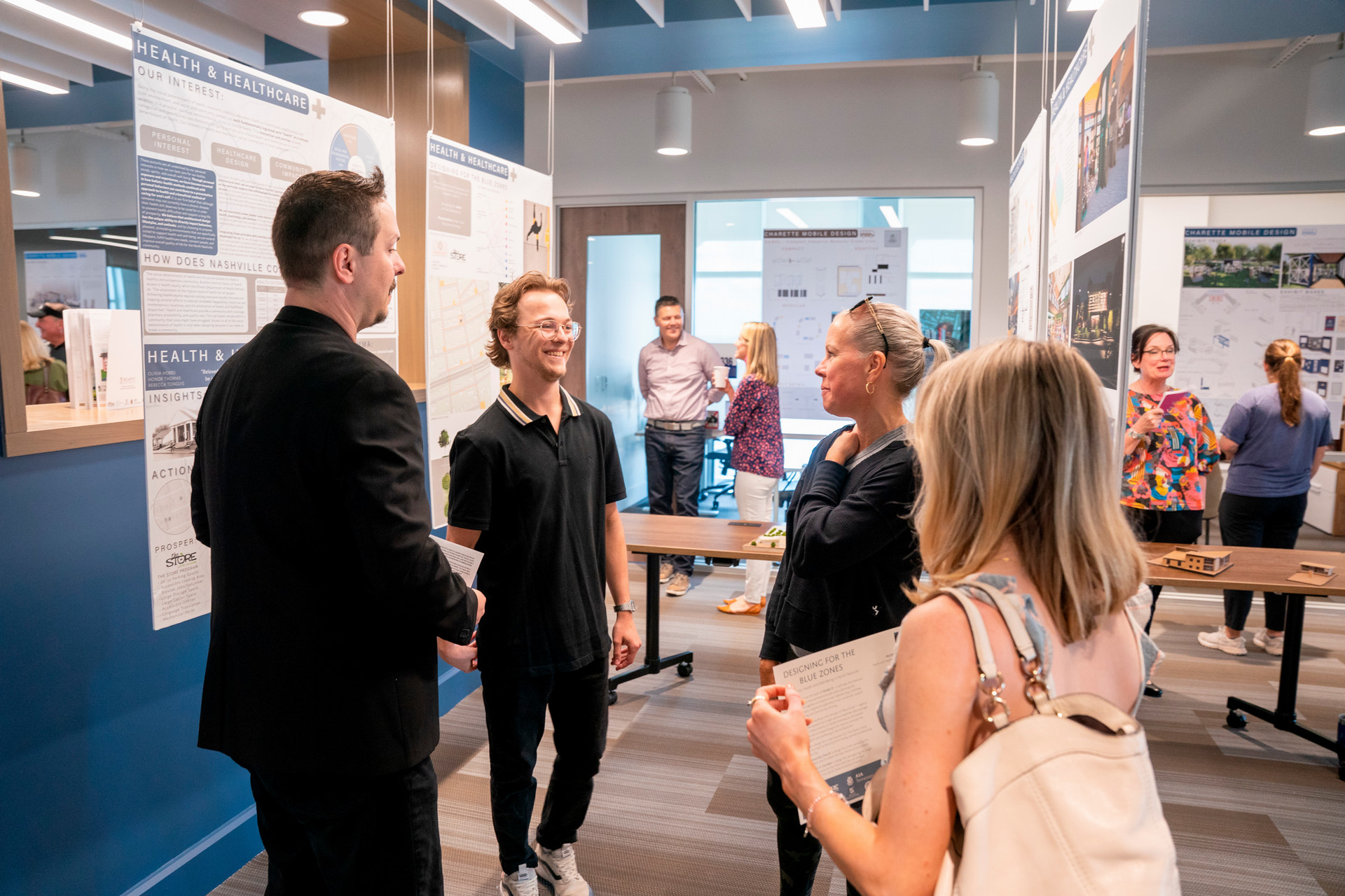 Students presenting the exhibit